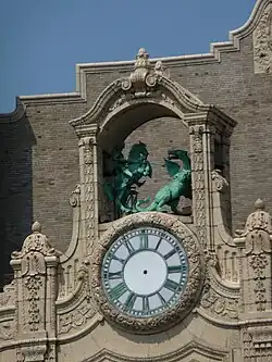 The clock and the Saint George and dragon figures atop the theater