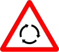 7i) — Roundabout ahead