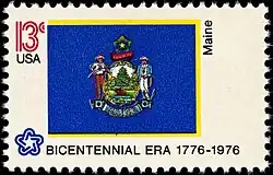The Maine state flag as depicted in the 1976 bicentennial postage stamp series.