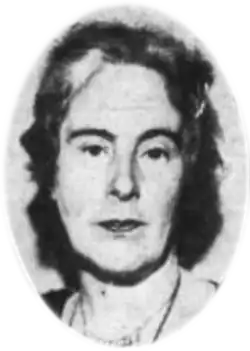A black-and-white photograph of a woman's head