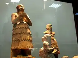 Ishqi-Mari (forefront, in profile), before larger figures[1]