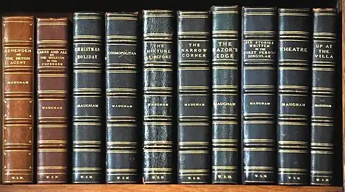 spines of handsomely leather-bound books with gold lettering, all of Maugham's own writings