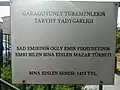 Signboard in the entrance to mausoleum in Turkmen language.