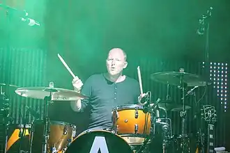 Barnard playing with Archive in 2013