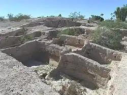 A large plaza in front of the Temple mound which was enclosed by a large adobe wall.