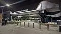 Station concourse and entrance at night, October 2022