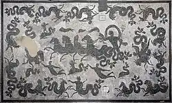 A panorama of the black and white mosaic from the Baths of Neptune in Ostia Antica.