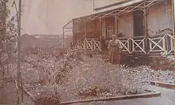 Evalina McHardy (William's wife) in front of the house before the master bedroom was added in 1908.