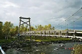Suspension bridge crossing the Näätämöjoki river