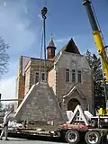 The Oneida Stake Academy's front gable being restored.