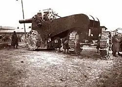 A 305/17 gun in traveling position showing its castering rear wheels.