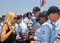 Image 74Playmate of the Year and People for the Ethical Treatment of Animals spokesperson Pamela Anderson, signing DVDs at the USS Halsey