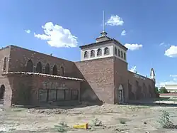 The historic El Cid Castle was a bowling alley which resembled a Moorish Castle. It was built by Dr. Kenneth Hall, a physician who served the community of Sunnyslope in Phoenix. Construction on the structure began in 1963 and was completed in 1980. It was located at the Northwest corner of 19th Ave and West Cholla Drive which is on the opposite side of Sunnyslope's western boundary.