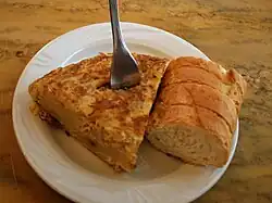 Pincho de tortilla – a slice of Spanish omelette often served on bread.