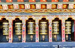 Prayer wheel niches on the walls of the main temple