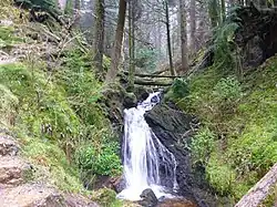 Waterfall beside the path in Upper Puck's Glen