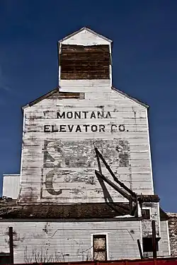 The Historic Montana Elevator Co. elevator next to the tracks.
