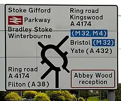 A road sign with the Transport typeface