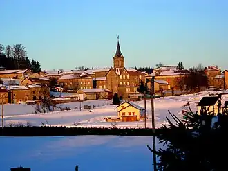 The church and surrounding buildings in winter