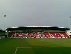 Aldershot fans in the Airwair Stand, celebrating their promotion to the Football League