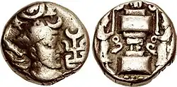 Late Hunnic coin of the Peroz type, with tamgha in front of the ruler.[1]