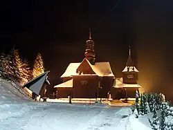 Wooden church of St. Joachim in Skawinki by night