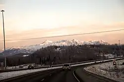Southbound George Parks Highway approaching the interchange with Fairview Loop Road and Hyer Road. The CDP's southern edge, where it borders with the Gateway CDP, is seen at left.