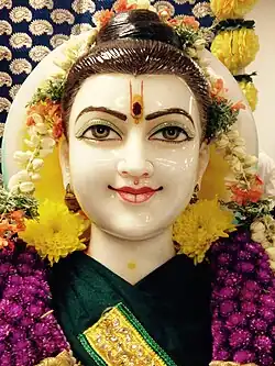 colourful statue of the saint