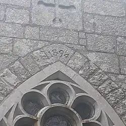 The year 1894 etched into stone