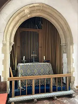 The organ chamber of 1912 with the north aisle altar