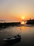 The sunset in front of the Long Pier of Tamsui