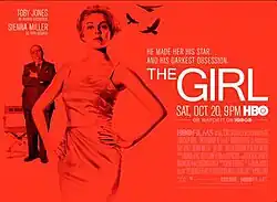 Red poster with write writing. Picture of a woman with man in the background. The title The Girl is seen to the right of the image.