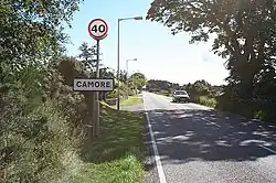 Road sign that reads Camore.