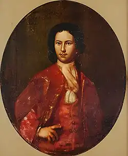 Portrait of Thomas 'Buck' Whaley wearing a red coat and white scarf