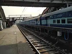 A passenger train standing on platform 3 in Patna Junction.