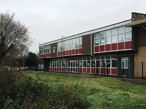 Side view of the older section of Adeilad Uniondeb.