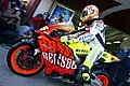 Valentino Rossi, sitting on his special liveried Repsol Honda at the 2003 Valencian Community Grand Prix