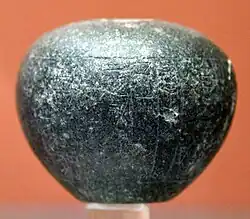 The votive macehead in the name of King Nam-Mahani and Queen Ninkagina of Lagash, dedicated to god Kindazi, circa 2100 BCE. British Museum.