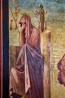 Ancient Greek first-century fresco from Pompeii the sacrifice of Iphigenia. The Virgin adopted a similar garment in paintings from ancient Greek times.