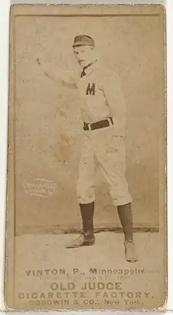 Standing man in baseball uniform