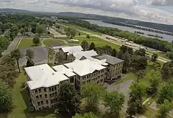 Wyalusing Academy, in Prairie du Chien, with the Mississippi River in the background