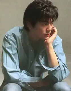 Ozaki on the cover of his album Gairojyū (1988)
