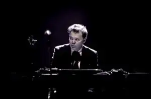 Larry Mullins playing keyboards with Nick Cave and the Bad Seeds in 2017.